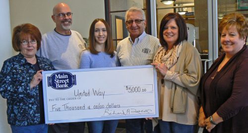 Employees at Main Street Bank completed their campaign for the United Way of the Upper Ohio Valley with a total of $5,000. Displaying their check are, from left: Becky Randolph, Bob Furka, Lindsay Holmes, Joe Donahue, Lee Ann Wetsell, and Mary Ann Stephens